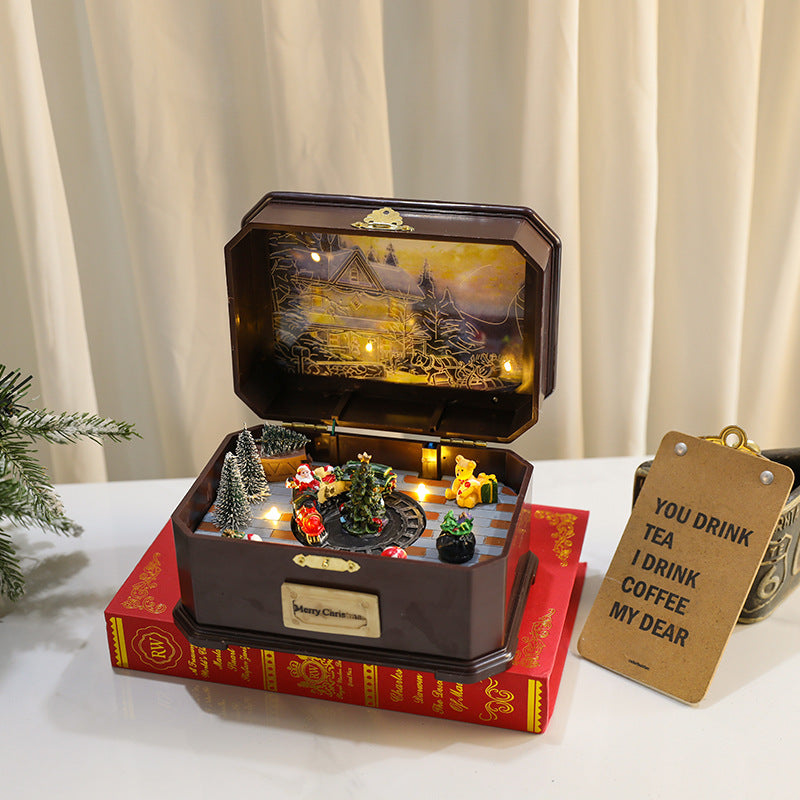 Christmas gift will be a rotating glowing USB battery dual-use music box